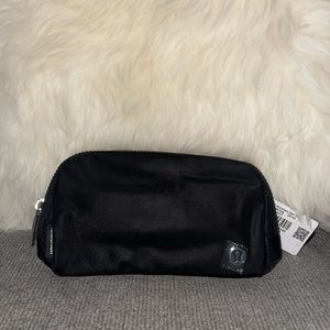 Lululemon Everywhere belt bag — “lululemon” on strap